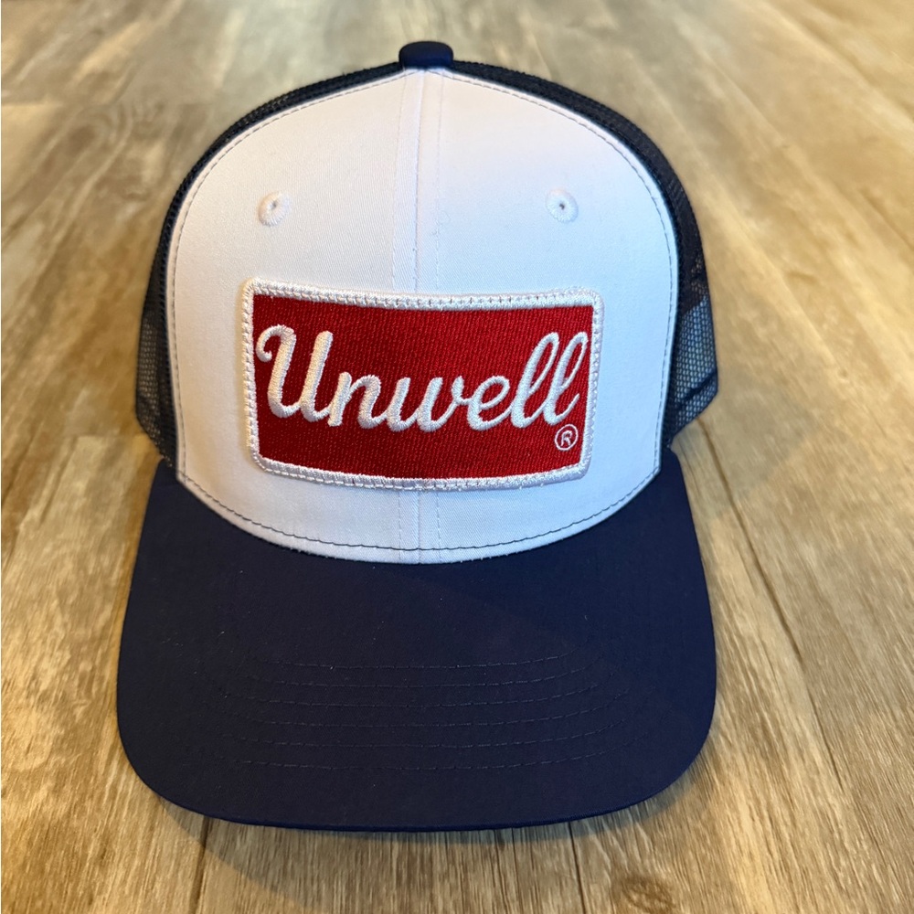 Unwell White and Blue Trucker Hat by Call Her Daddy Podcast Host Alex Cooper